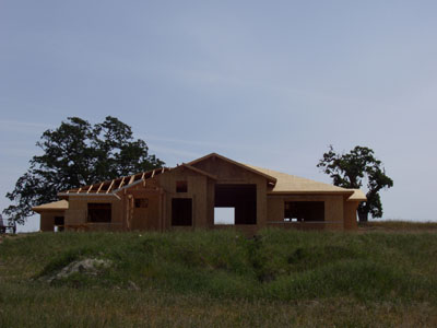 Front with framing complete and trusses skinned